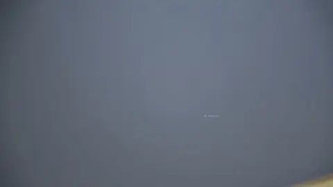 Asian Teen with Black Bob Hair in Bedroom