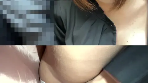 Asian Redhead Undressing on Couch