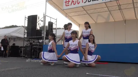Asian Teen Cheerleaders Dance in Uniform