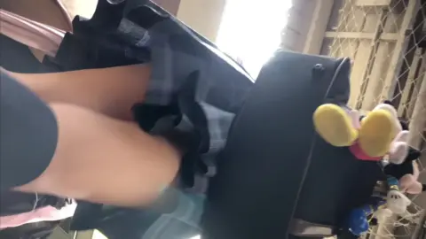 Asian Couple Having Intimate Moment on Public Transport