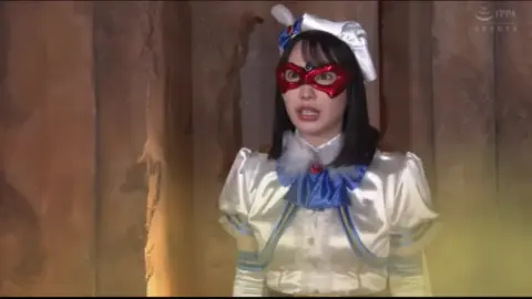 Asian Women in Ancient Temple Ruins