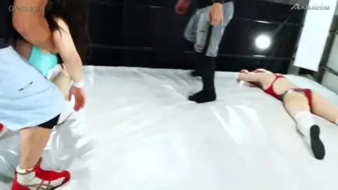 Wrestling Ring Sex with Red and Black Haired Babes