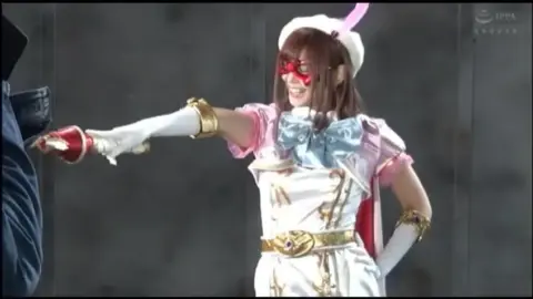 Asian Cosplay Fighter in Industrial Setting