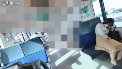 Dark-Haired Woman Undressed in a Vehicle