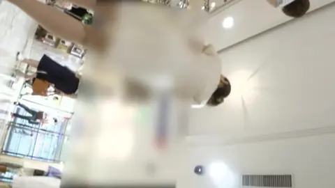 Asian Girls in City Street and Clothing Store