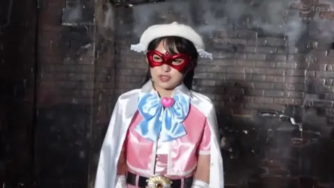 Asian Superheroine in Explicit Rooftop Encounter