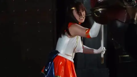 Asian Teen in Revealing Outfit