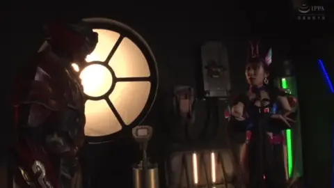 Asian Duo in Fantasy Costumes Intimate Encounter