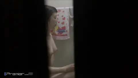 Asian Girl Bathing and Urinating