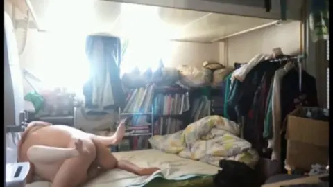 Asian Couple Intimate Moments in Bedroom