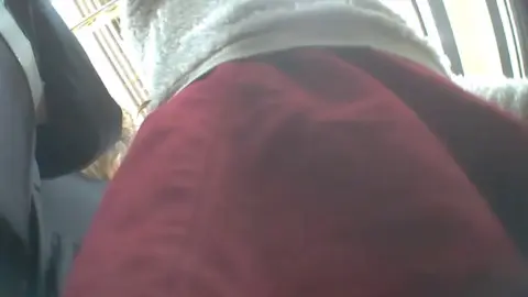 Blonde Women in Red Coat and White Sweater