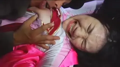 Asian Couple Intimate Moments in Costume