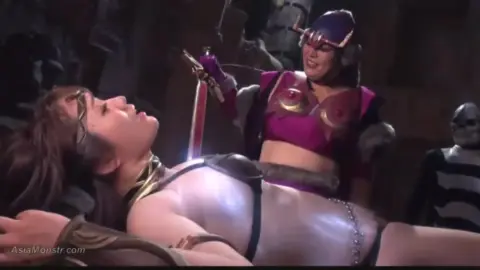 BDSM Dungeon Scene with Asian and Blonde Performers
