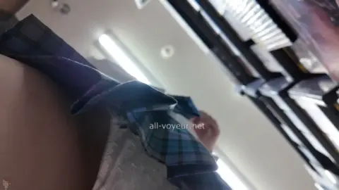 Asian Teen in Skirt Lifting to Reveal Underwear