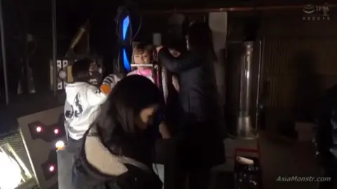 Asian Performers in Erotic Costumes