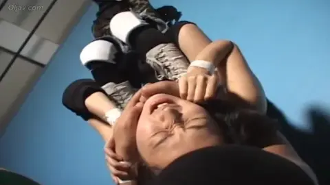 Asian Women Wrestling in Sports Bras