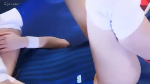 Asian Women Wrestling in Leather Outfits