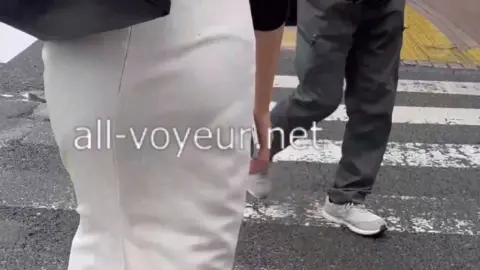 Asian Girl Riding Bicycle and Walking