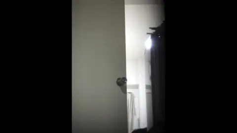 Asian Teen Undresses in Bedroom