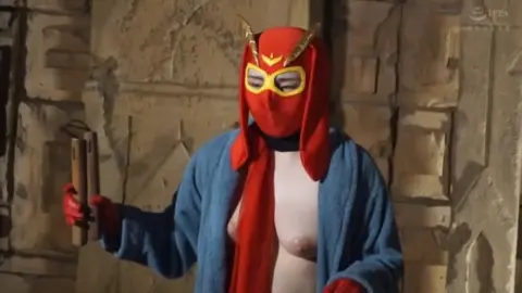 Asian Man in Red Mask and Robe in Stone Hallway