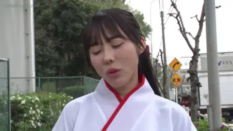 Asian Performers in BDSM Scenes with Restraints and Whipping