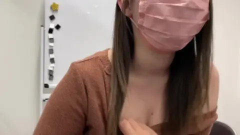 Asian Schoolgirl in Pink Mask