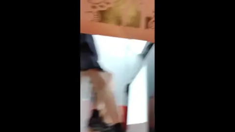 Asian Girl in Black Skirt on Stairs and Escalator