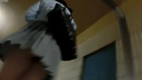 Asian Teen in Gray Skirt on Stairwell