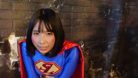 Asian Superwoman Costume Erotic Scene