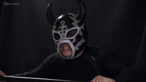 Wrestling Match with Masks and Leotards