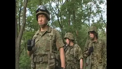 Asian Woman in Cockpit, Military Men, Costumed Fight