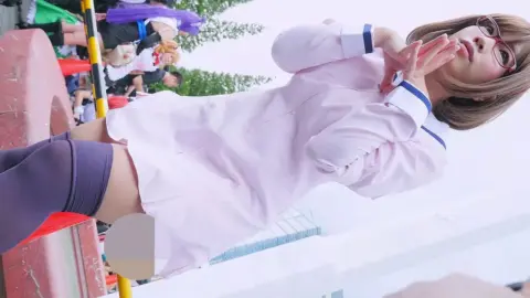 Asian Girls Undressing at Outdoor Market