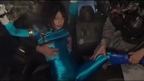 Asian in Spandex Suit Bondage Scenes