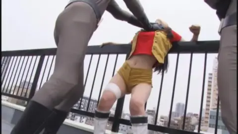 Costumed Men Restrain Woman in Various Positions