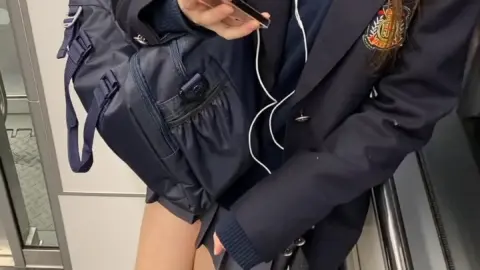 Asian Teen in School Uniform Elevator Scene