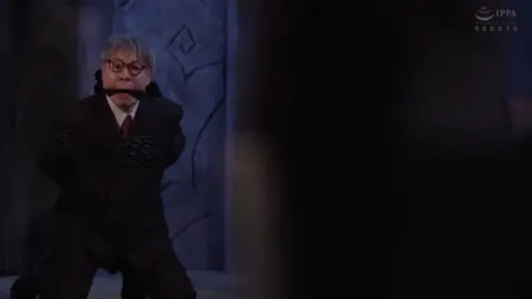 Office Embrace with Glasses and White Dress