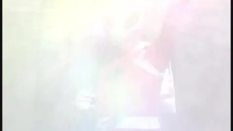 Asian Superheroine in Pink Bodysuit