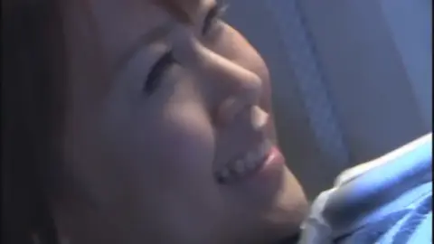 Asian Women in Metallic Suits Engage in Sword Fight