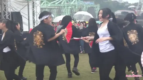 Asian Girls Dancing Outdoors