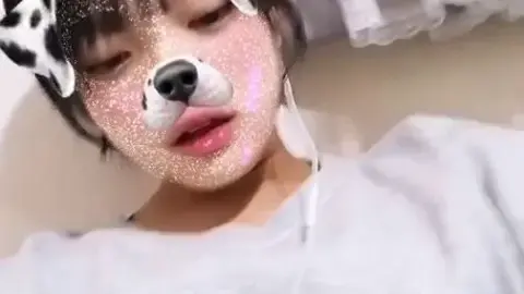 Asian Girl Takes Selfies with Dog Filter