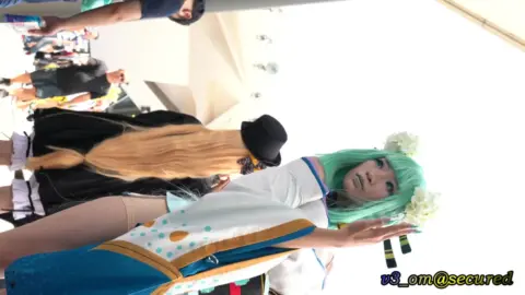 Asian Cosplay Girls at Outdoor Festival