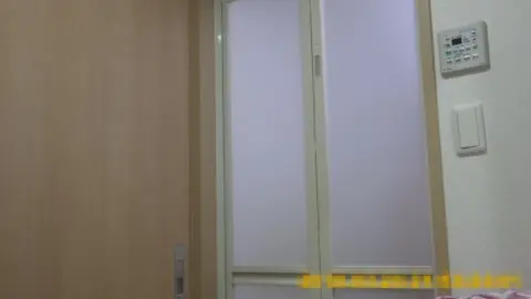 Asian Girl in Bathroom with Towel