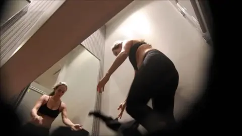 Blonde Bombshell Dances in Bathroom