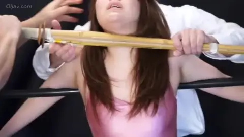 Brunette BDSM Restraint and Struggle