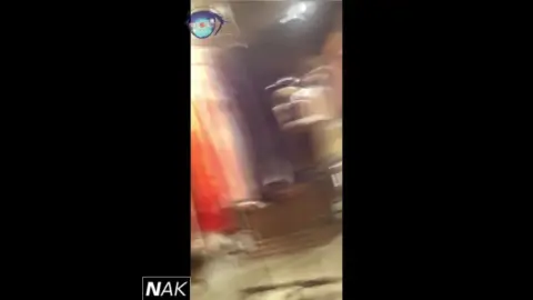 Blonde in Clothing Store