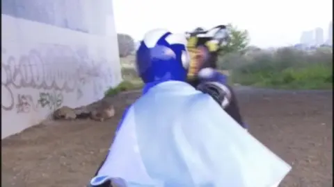 Asian Men in Costumes Outdoors