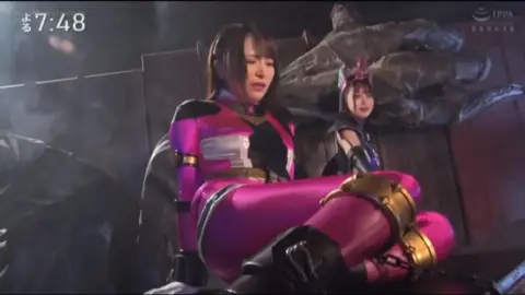 Asian Performers in Costumes Engage in Explicit Acts