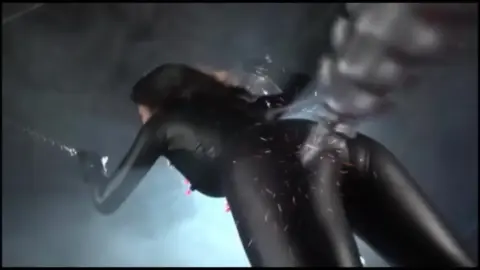 Asian Couple in Robotic Costumes Fights and Intimacy