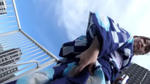 Asian Teen Flaunts Outfit on Rooftop