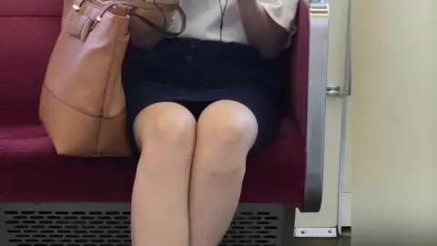 Asian Girl on Public Transport